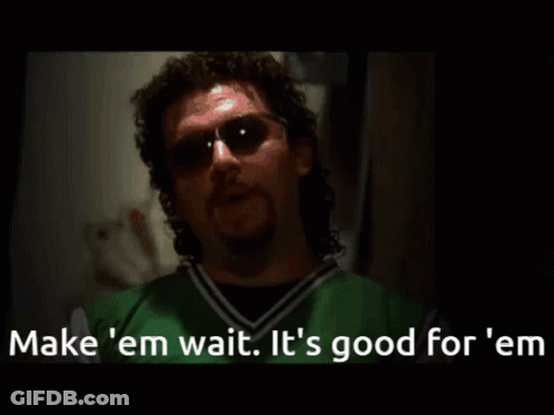 A Man Wearing Sunglasses And A Green Shirt Says Make Em Wait It 'S Good For ' Em GIF