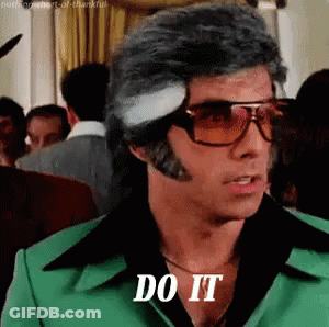 A Man Wearing Sunglasses And A Green Suit Says `` Do It '' . GIF