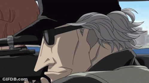 A Man Wearing Sunglasses And A Hat Is Holding A Rifle GIF