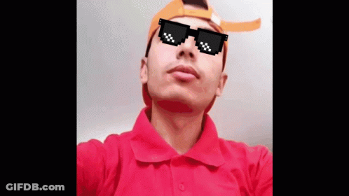 A Man Wearing Sunglasses And A Hat Looks Up At The Sky GIF