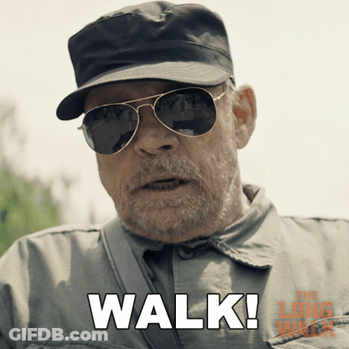 A Man Wearing Sunglasses And A Hat Says " Walk " In White Letters GIF