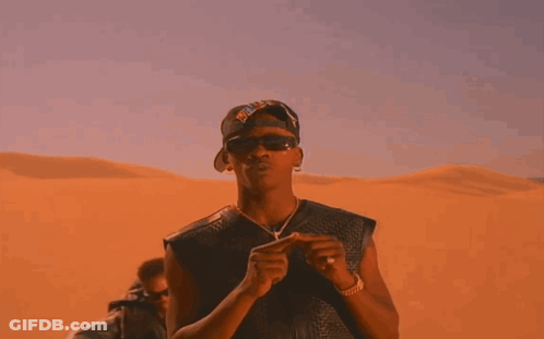 A Man Wearing Sunglasses And A Hat That Says ' Chicago Bulls ' On It GIF