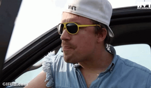 A Man Wearing Sunglasses And A Hat That Says " Wvt " GIF