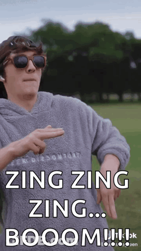 A Man Wearing Sunglasses And A Hoodie Says Zing Zing Zing ... Booom ! GIF