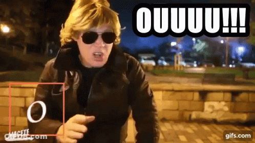 A Man Wearing Sunglasses And A Jacket Says Ouuuu !!! GIF