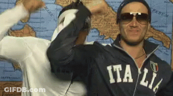 A Man Wearing Sunglasses And A Jacket That Says Italia GIF