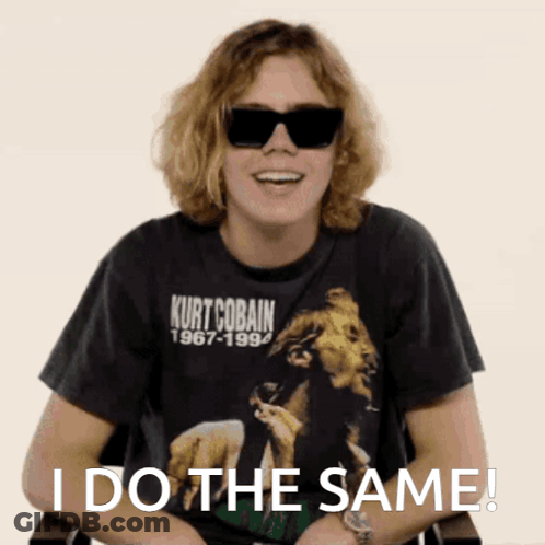 A Man Wearing Sunglasses And A Kurt Cobain 1967-1994 Shirt Says I Do The Same GIF