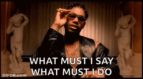 A Man Wearing Sunglasses And A Leather Jacket Says What Must I Say What Must I Do GIF