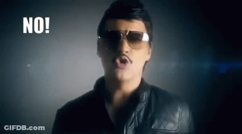 A Man Wearing Sunglasses And A Mustache Is Singing A Song In A Dark Room . GIF