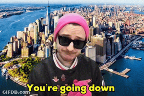 A Man Wearing Sunglasses And A Pink Beanie Says You 'Re Going Down GIF