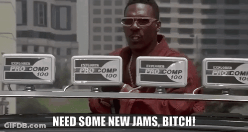 A Man Wearing Sunglasses And A Red Jacket Says " Need Some New Jams Bitch ! " GIF