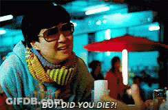 A Man Wearing Sunglasses And A Scarf Is Saying But Did You Die GIF