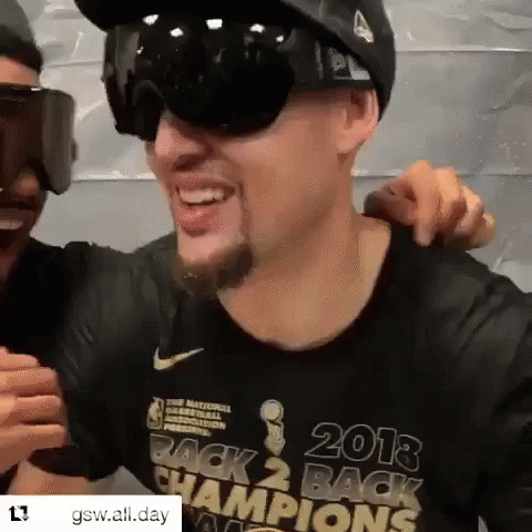 A Man Wearing Sunglasses And A Shirt That Says 2013 Back 2 Back Champions GIF