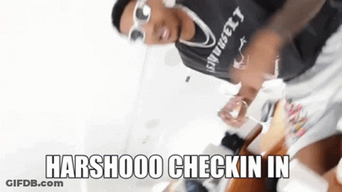 A Man Wearing Sunglasses And A Shirt That Says ' Harshooo Checkin In ' On It . GIF