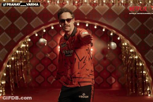 A Man Wearing Sunglasses And A Shirt That Says Iroon On It GIF