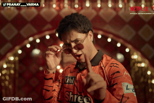 A Man Wearing Sunglasses And A Shirt That Says Shree GIF