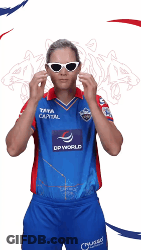 A Man Wearing Sunglasses And A Shirt That Says Tata Capital On It GIF