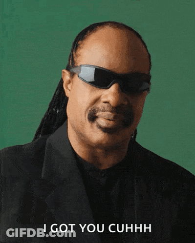 A Man Wearing Sunglasses And A Suit Says " I Got You Cuhhh " GIF