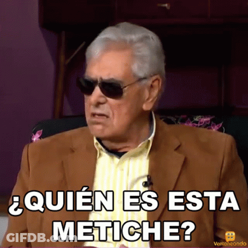 A Man Wearing Sunglasses And A Suit Says " Quien Es Esta Metiche " GIF