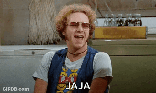 A Man Wearing Sunglasses And A T-Shirt That Says ' Jaja ' On It Is Laughing GIF
