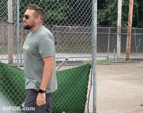 A Man Wearing Sunglasses And A T-Shirt That Says Ny On It GIF