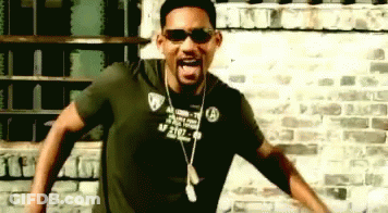 A Man Wearing Sunglasses And A T-Shirt That Says Will Smith GIF