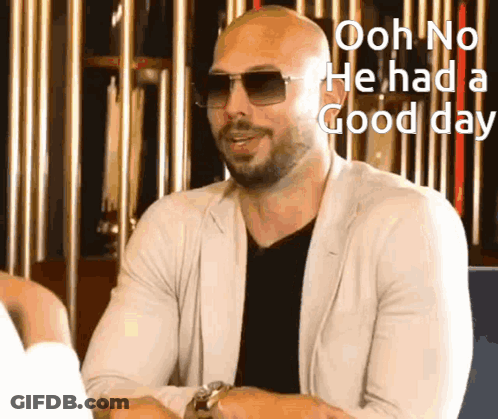 A Man Wearing Sunglasses And A White Jacket Says Ooh No He Had A Good Day GIF
