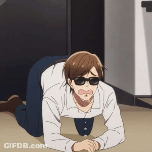 A Man Wearing Sunglasses And A White Shirt Is Crawling On The Floor GIF