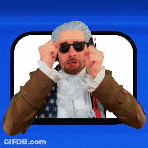 A Man Wearing Sunglasses And A Wig Is Making A Funny Face GIF