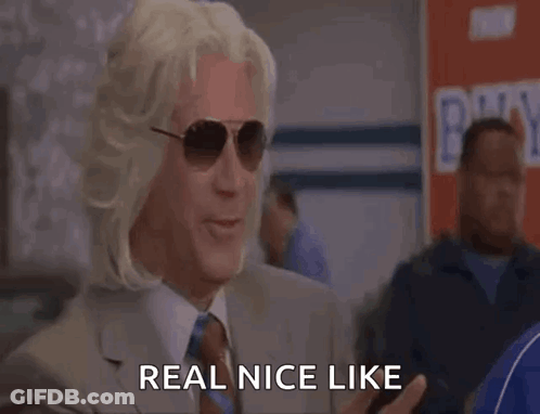 A Man Wearing Sunglasses And A Wig Says Real Nice Like GIF