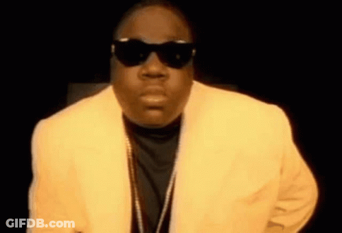 Man In Yellow Suit And Sunglasses GIF
