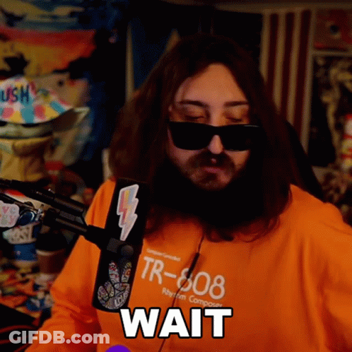 A Man Wearing Sunglasses And An Orange Shirt With Tr-808 On It GIF