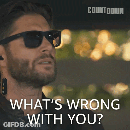 A Man Wearing Sunglasses And Earbuds Says What 'S Wrong With You GIF