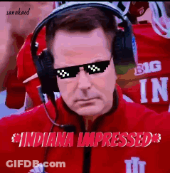 A Man Wearing Sunglasses And Headphones With The Words Indiana Impressed GIF