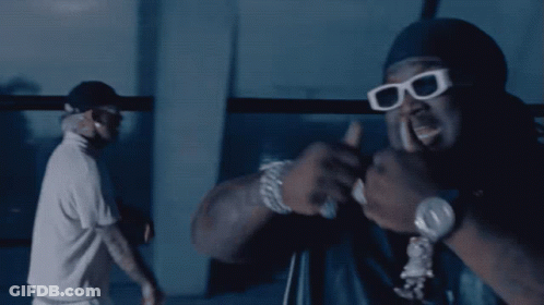 A Man Wearing Sunglasses Giving A Thumbs Up GIF