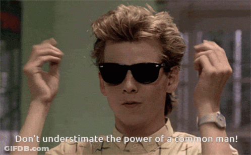 A Man Wearing Sunglasses Has The Words " Don 'T Underestimate The Power Of A Common Man " Below Him GIF