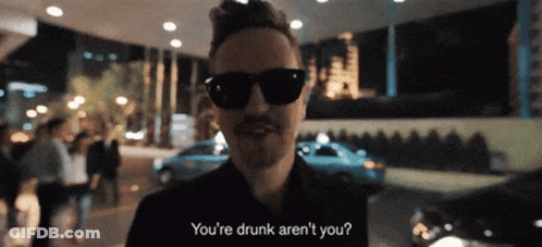 A Man Wearing Sunglasses Is Asking If He Is Drunk GIF