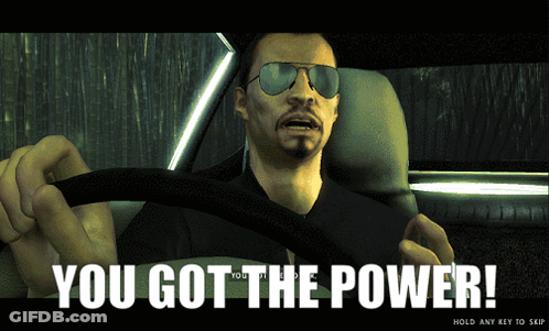A Man Wearing Sunglasses Is Driving A Car With The Words You Got The Power GIF