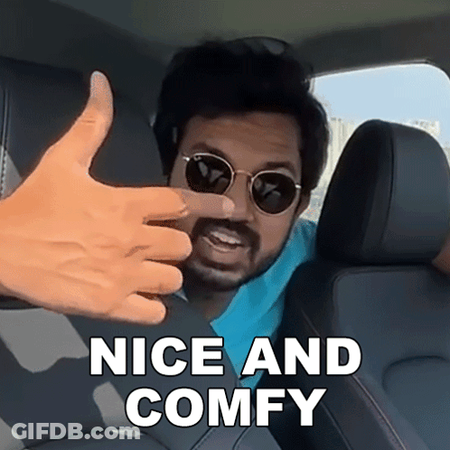 A Man Wearing Sunglasses Is Giving A Thumbs Up And The Words Nice And Comfy Are Below Him GIF