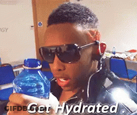 A Man Wearing Sunglasses Is Holding A Bottle Of Water With The Words Get Hydrated Written On It GIF