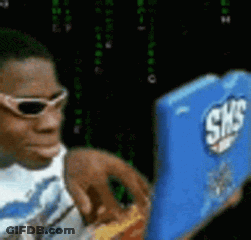 A Man Wearing Sunglasses Is Holding A Box Of Shredded Cheese GIF