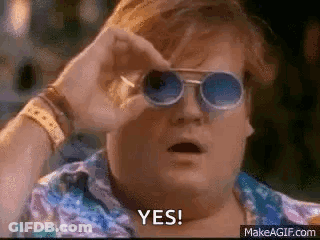 A Man Wearing Sunglasses Is Holding His Hand To His Eye And Says Yes . GIF