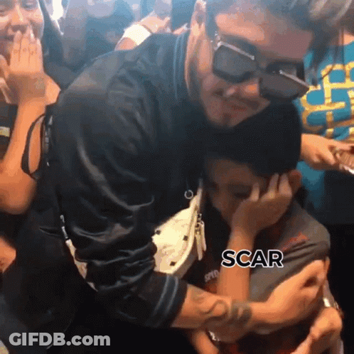 A Man Wearing Sunglasses Is Hugging A Little Boy With The Word Scar Written On The Bottom GIF
