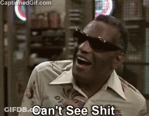 A Man Wearing Sunglasses Is Laughing And Saying `` Can 'T See Shit '' GIF