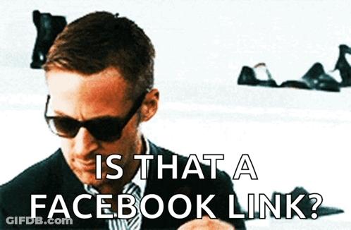 A Man Wearing Sunglasses Is Looking At His Phone With The Words Is That A Facebook Link Below Him GIF