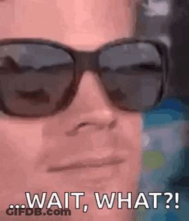 A Man Wearing Sunglasses Is Making A Funny Face And Says `` Wait , What ? '' GIF