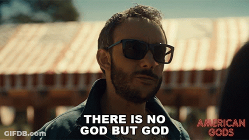 A Man Wearing Sunglasses Is Saying There Is No God But God GIF