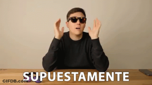 A Man Wearing Sunglasses Is Sitting At A Table With The Word Supuestamente Written On The Table GIF