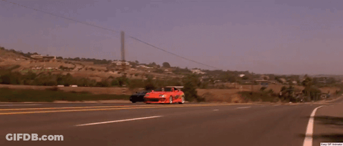 A Man Wearing Sunglasses Is Sitting In A Car With A Can Of Soda In His Hand GIF
