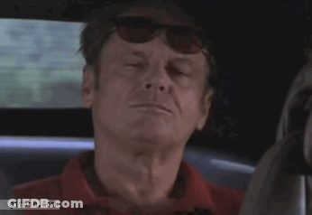 A Man Wearing Sunglasses Is Sitting In A Car With The Words Deal With It Below Him GIF